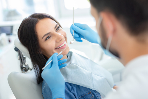front teeth crowns vs veneers